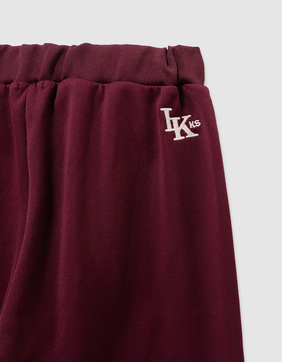 pantaloni da jogging bordeaux con strisce bianche per bambine
