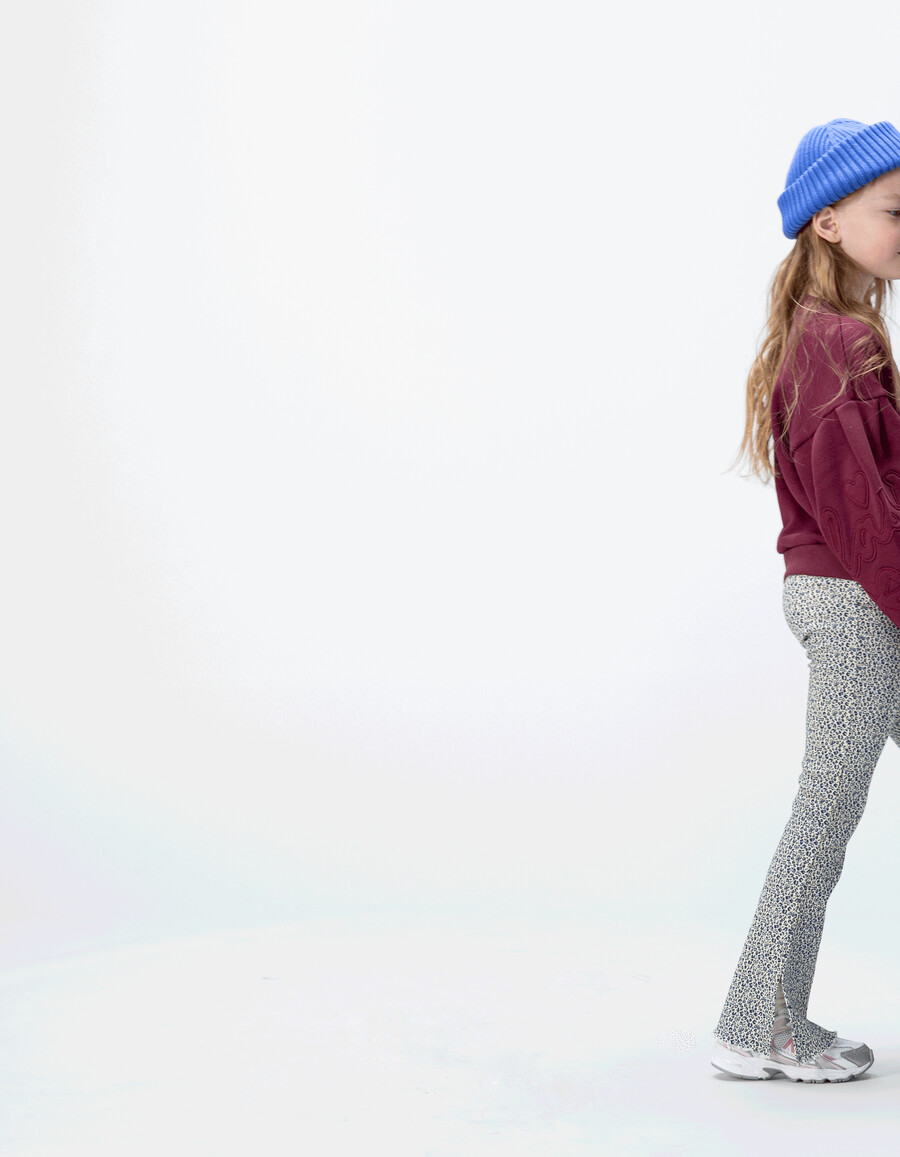 leggings svasati blu navy da bambina con stampa leopardata e fiocco