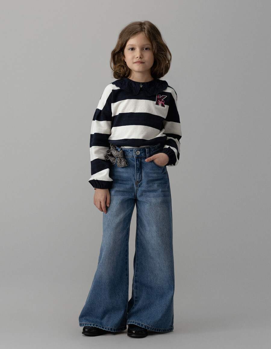 jeans blu a gamba larga per bambine con cintura leopardata