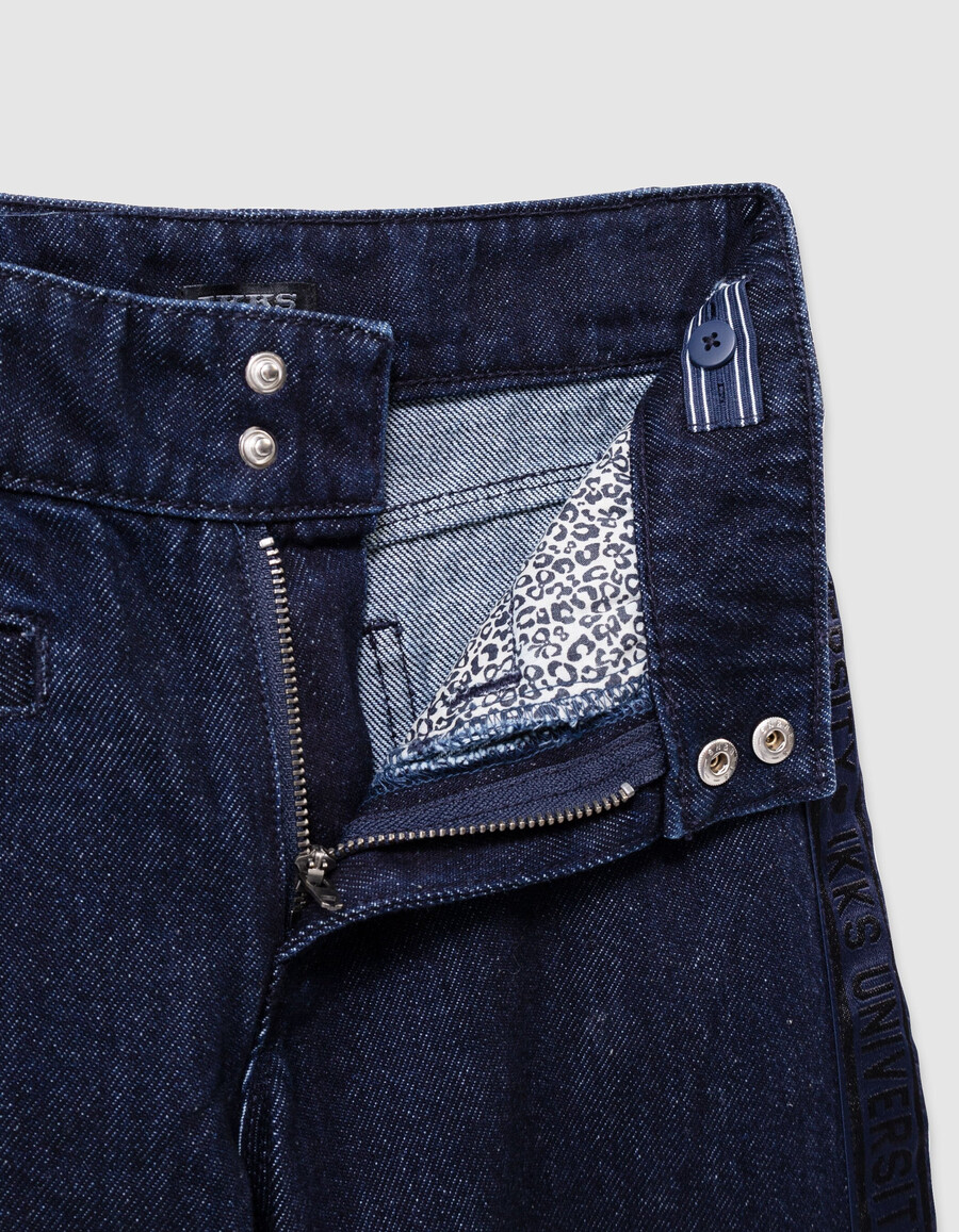 jeans blu a gamba larga per bambine con larghe fasce laterali