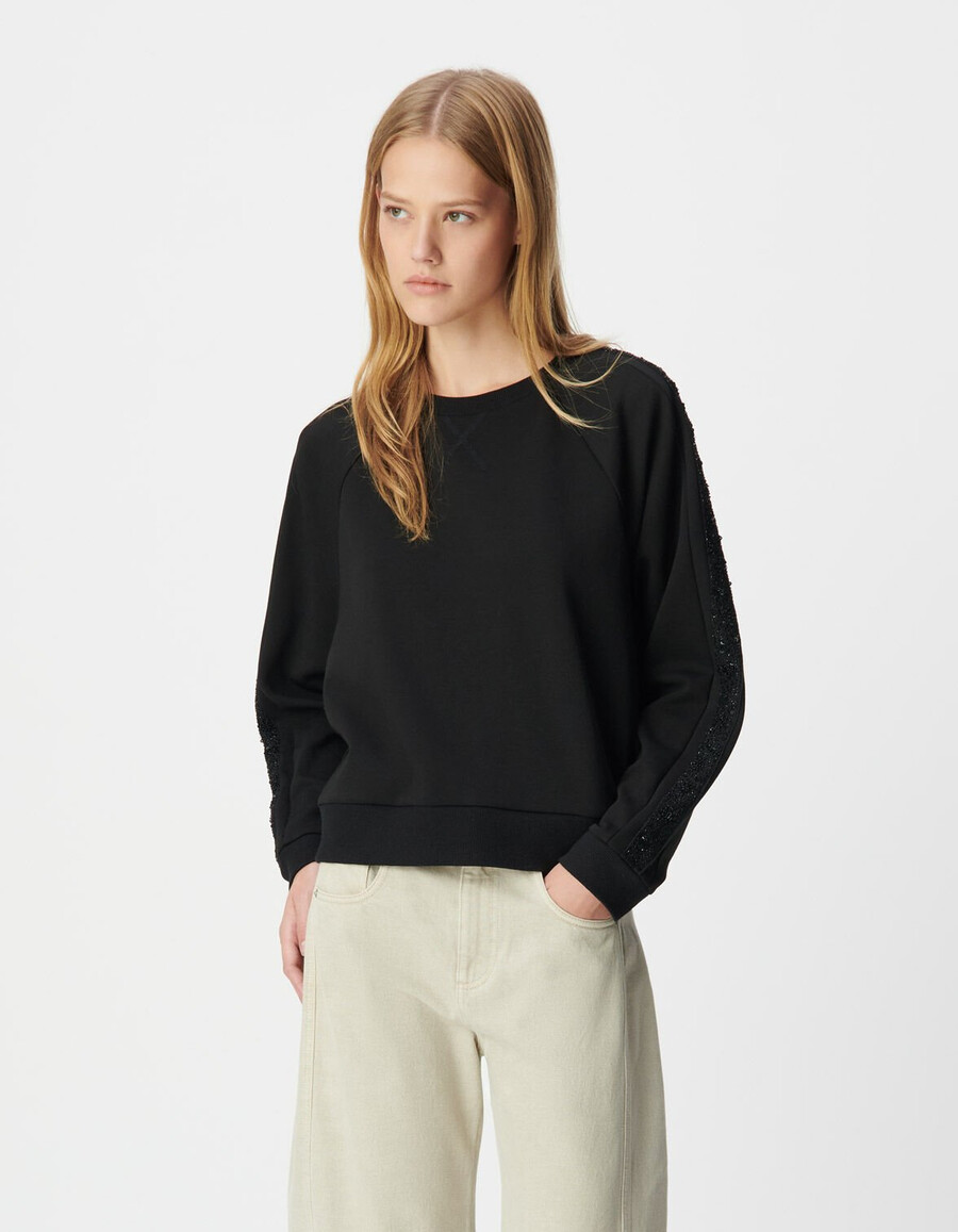 felpa oversize nera da donna bande lungo le maniche