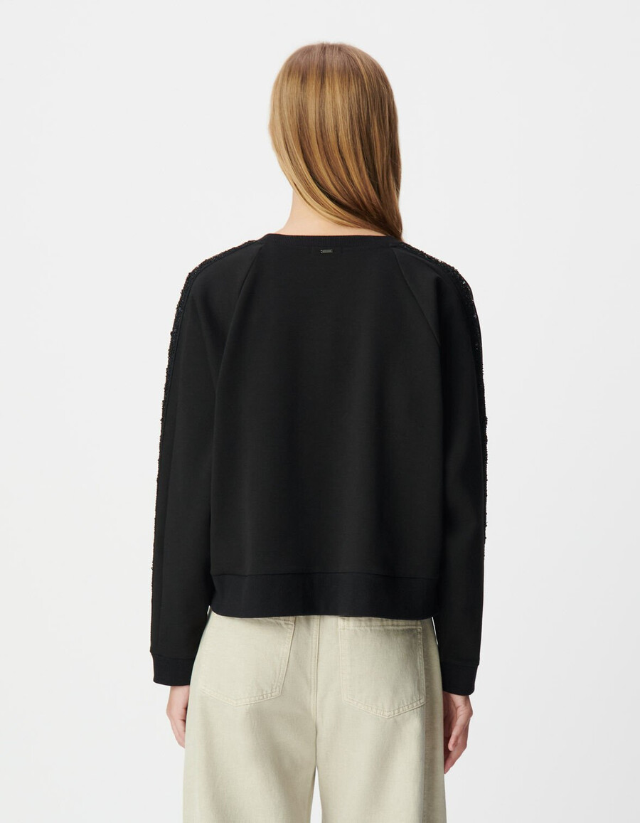 felpa oversize nera da donna bande lungo le maniche