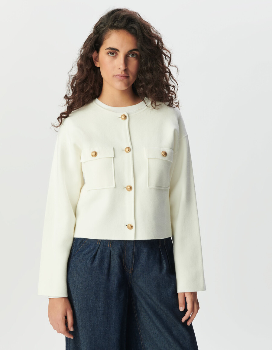 cardigan corto in maglia bianca da donna con tasche applicate