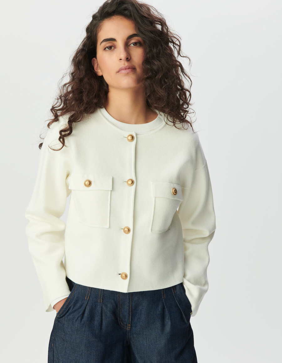 cardigan corto in maglia bianca da donna con tasche applicate