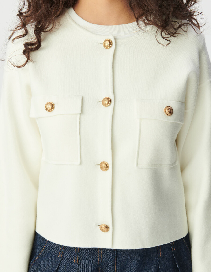cardigan corto in maglia bianca da donna con tasche applicate