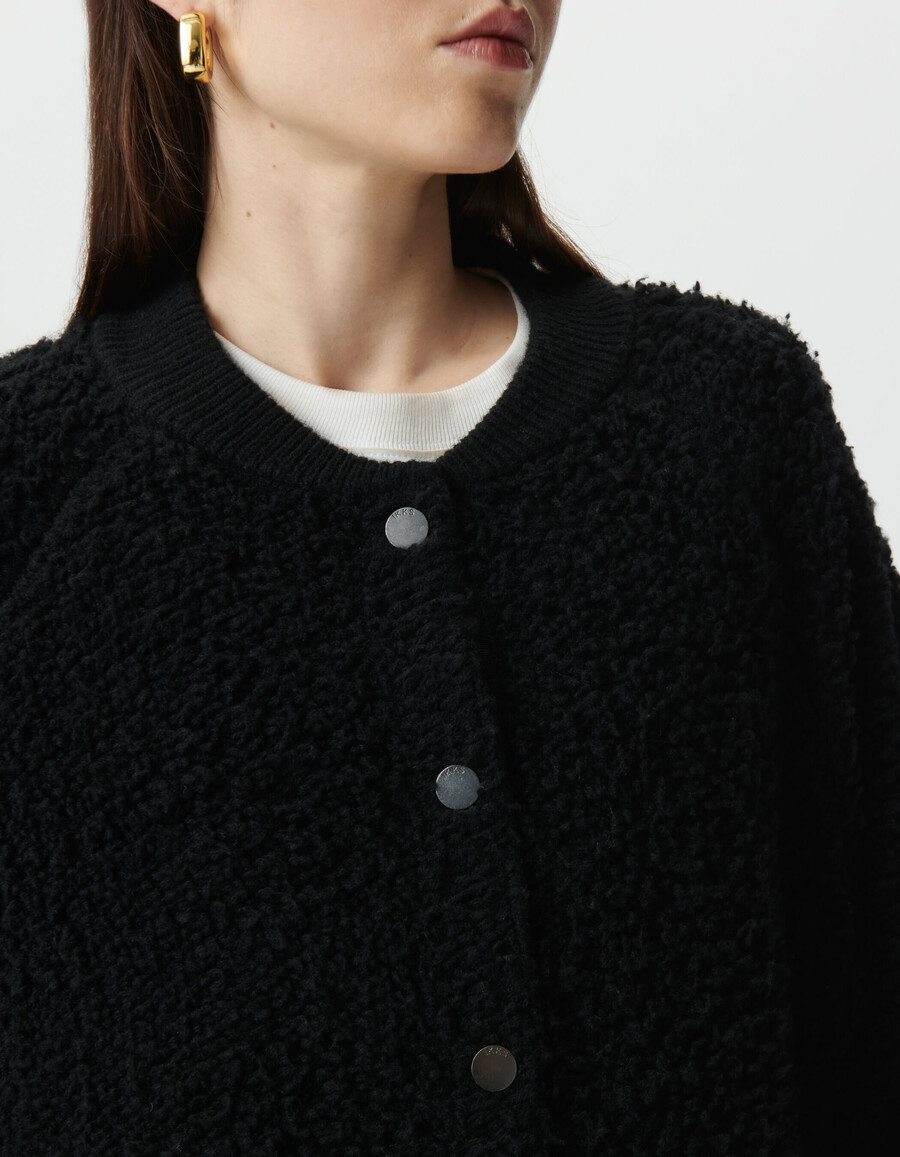cardigan in maglia bouclette nera da donna