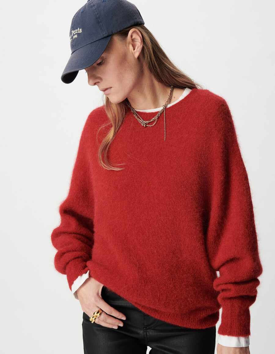 maglione rosso da donna con maniche a pipistrello