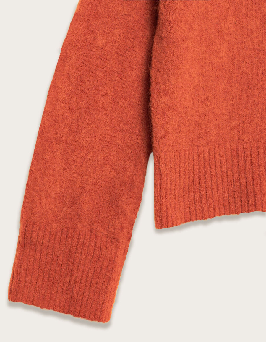 maglione oversize arancione con scollo a v da donna