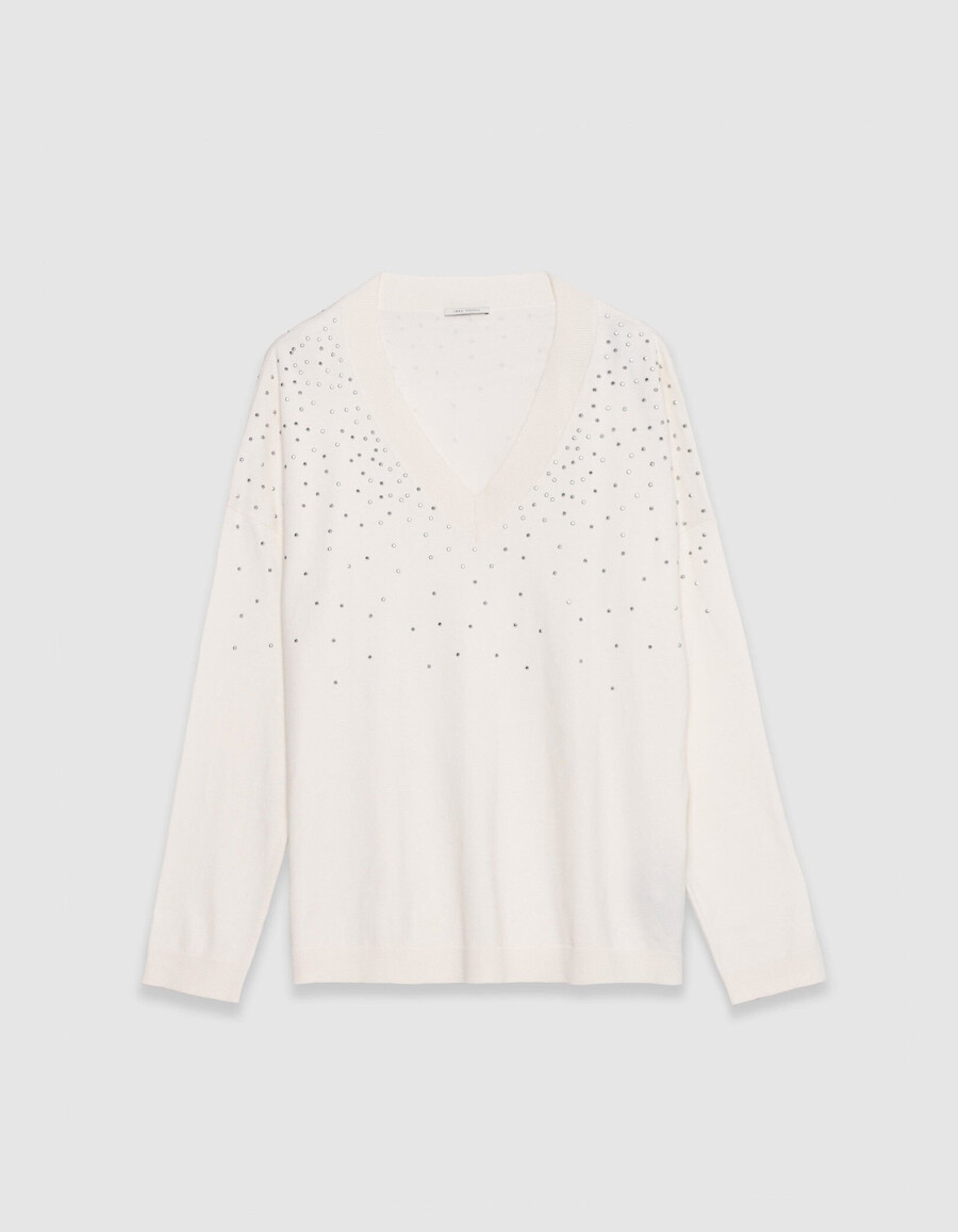maglione bianco da donna lavorato a maglia con scollo a v e borchie