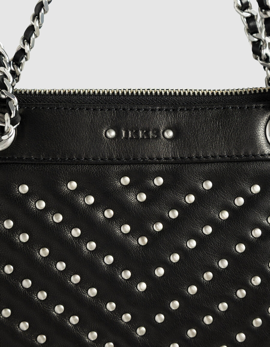 pochette da donna modello 1440 reporter in pelle trapuntata nera con borchie