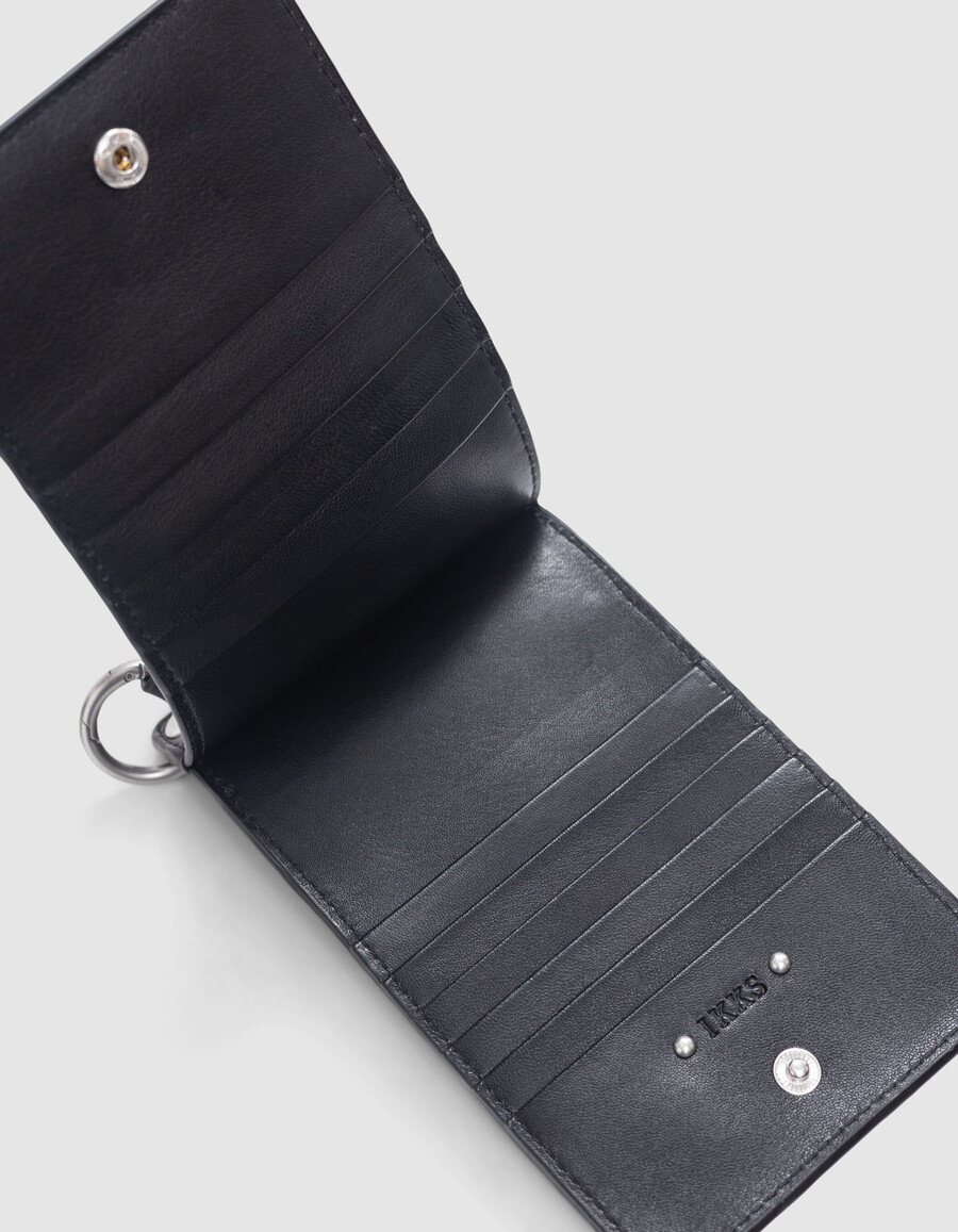 borsa porta telefono 111 in pelle nera con tracolla e borchie da donna