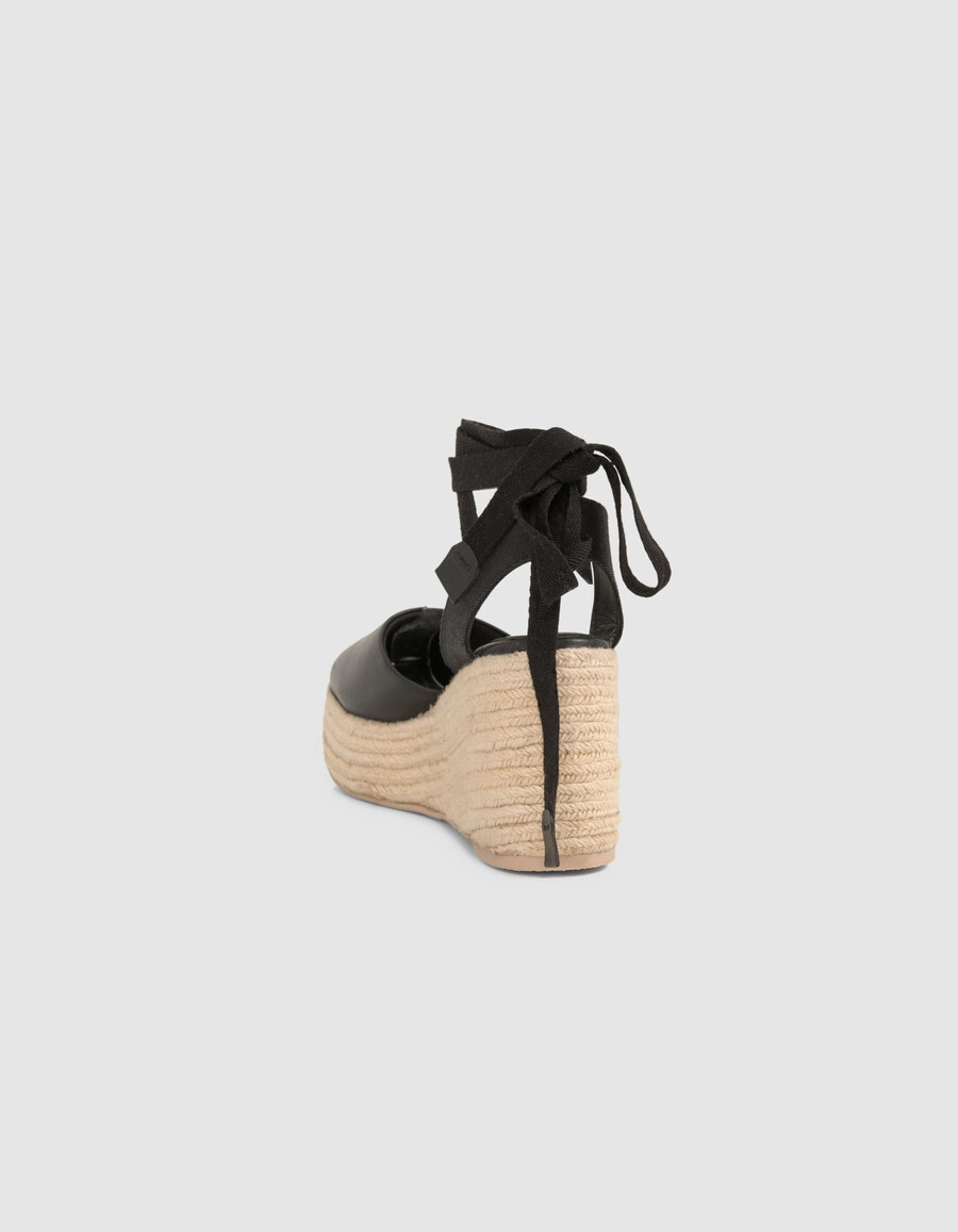 espadrillas con plateau e lacci in pelle nera da donna