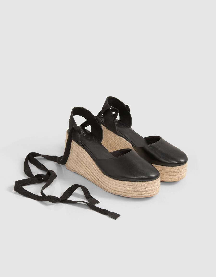 espadrillas con plateau e lacci in pelle nera da donna