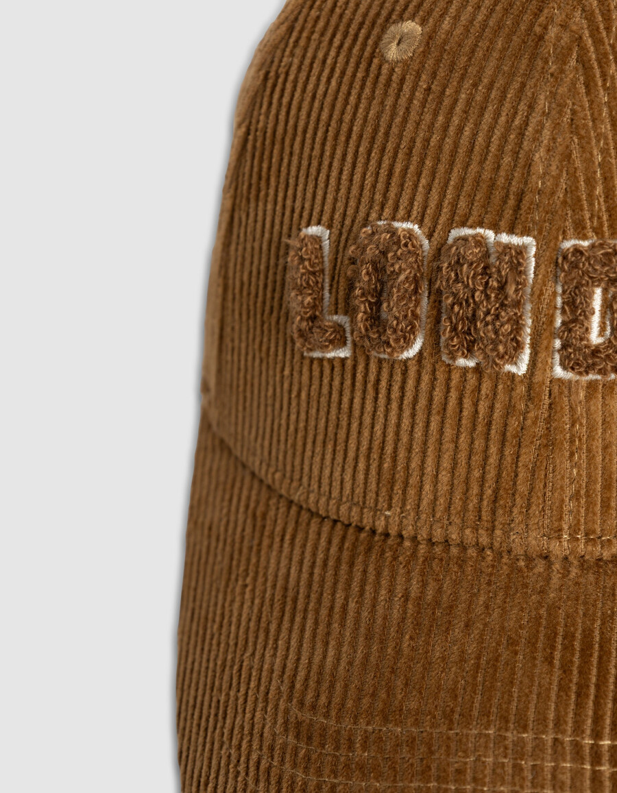 berretto da donna in velluto a coste beige con scritta bouclette