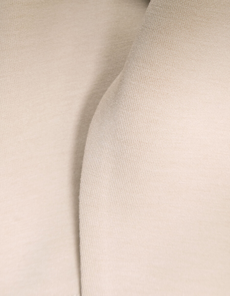 felpa beige da bambino con slogan in rilievo sul retro