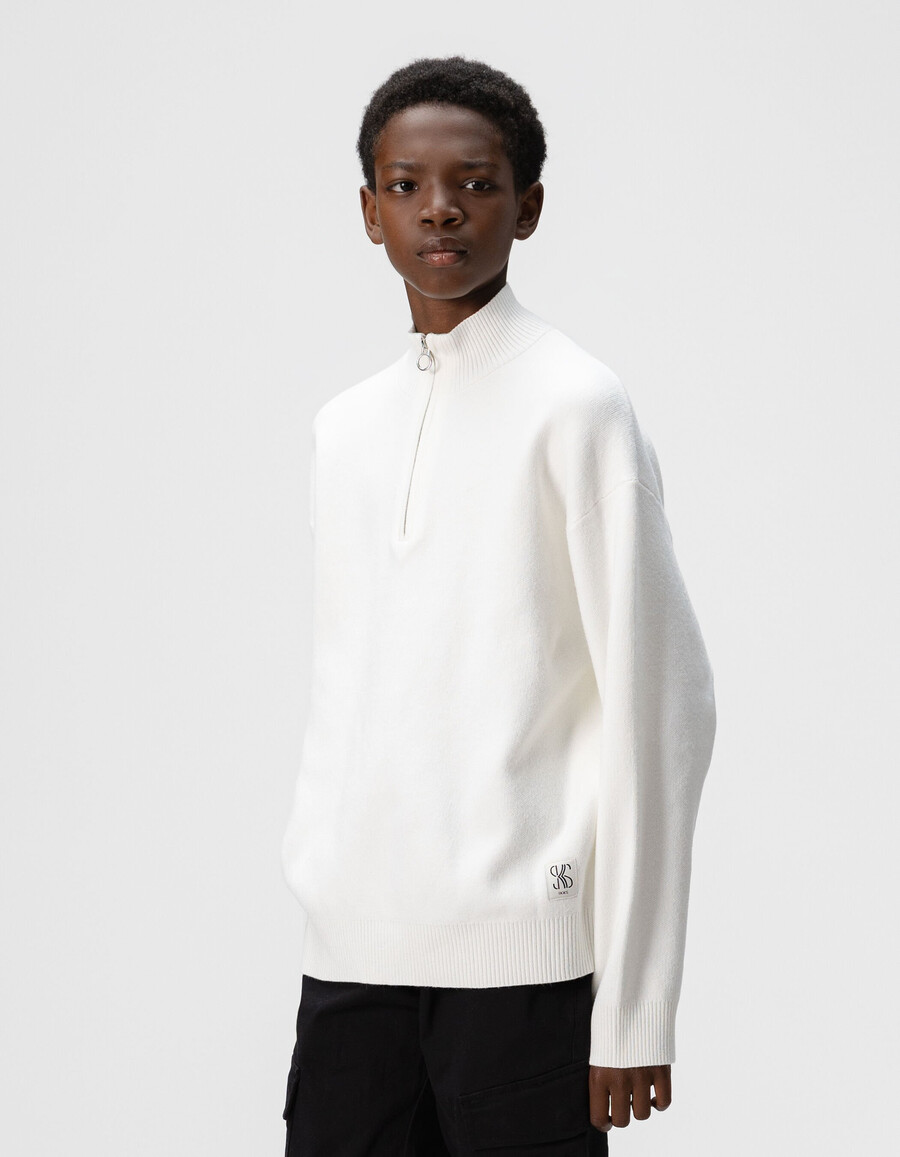 maglione bianco lavorato a maglia con cerniera sul collo per bambini