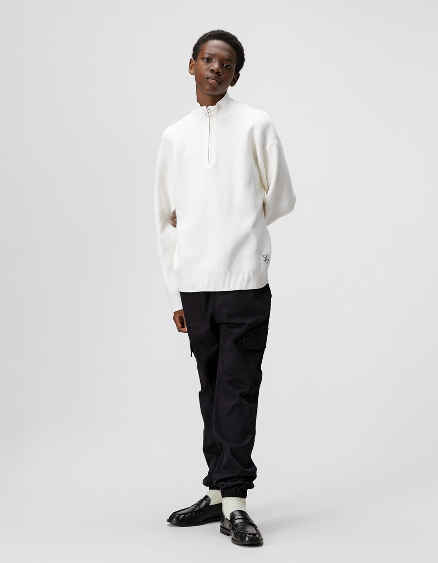 maglione bianco lavorato a maglia con cerniera sul collo per bambini