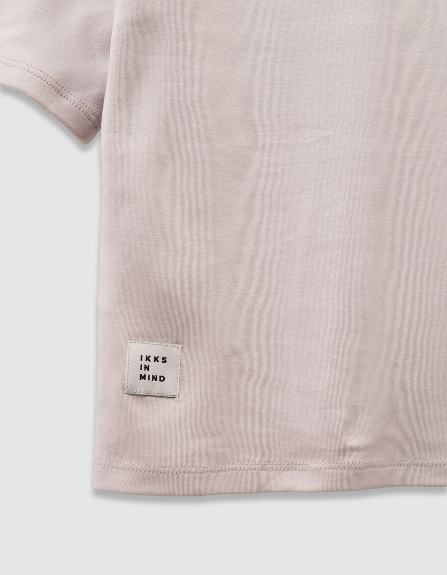 t-shirt beige in cotone biologico per bambine slogan in velluto floccato