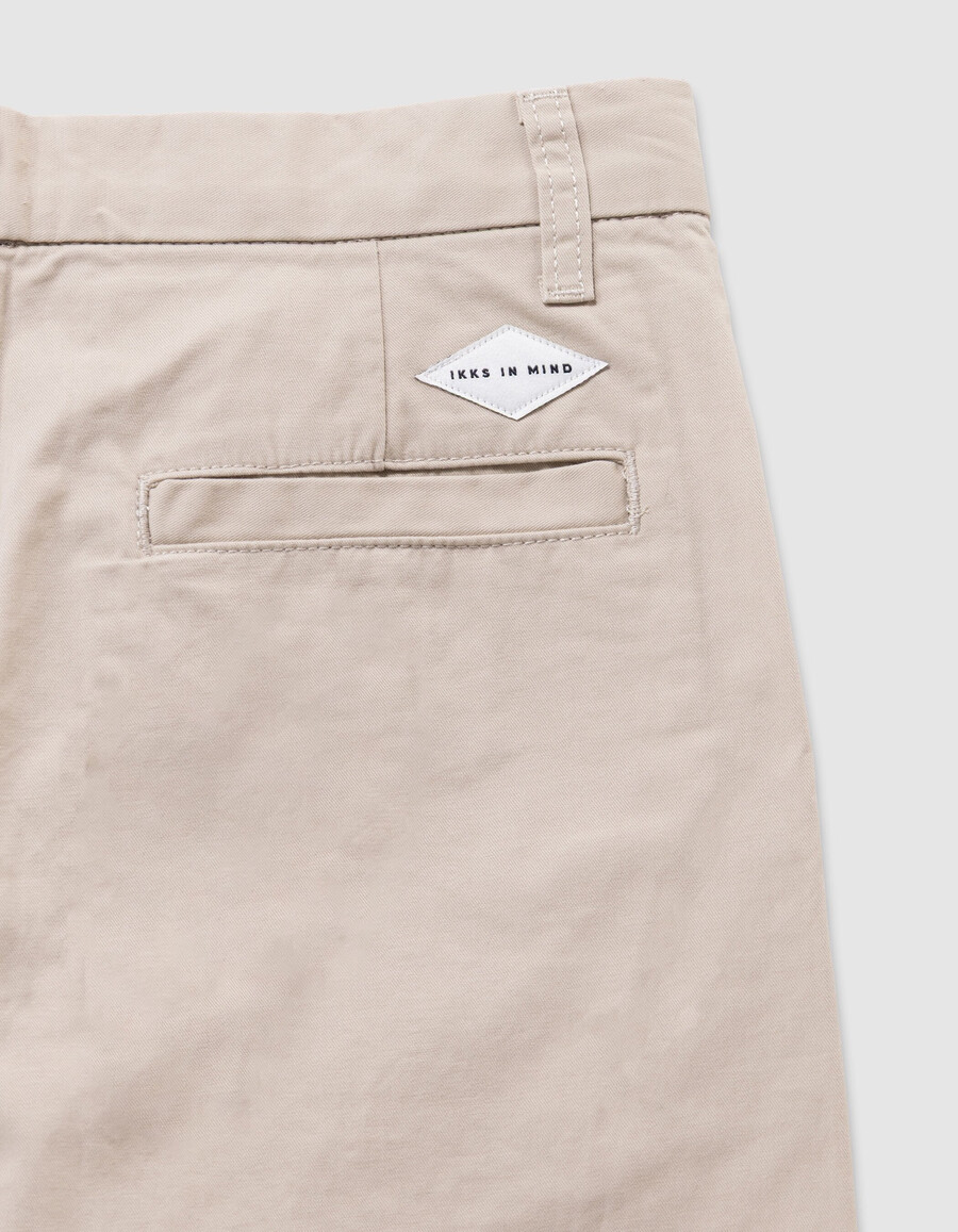 pantaloni chino beige larghi da ragazzo
