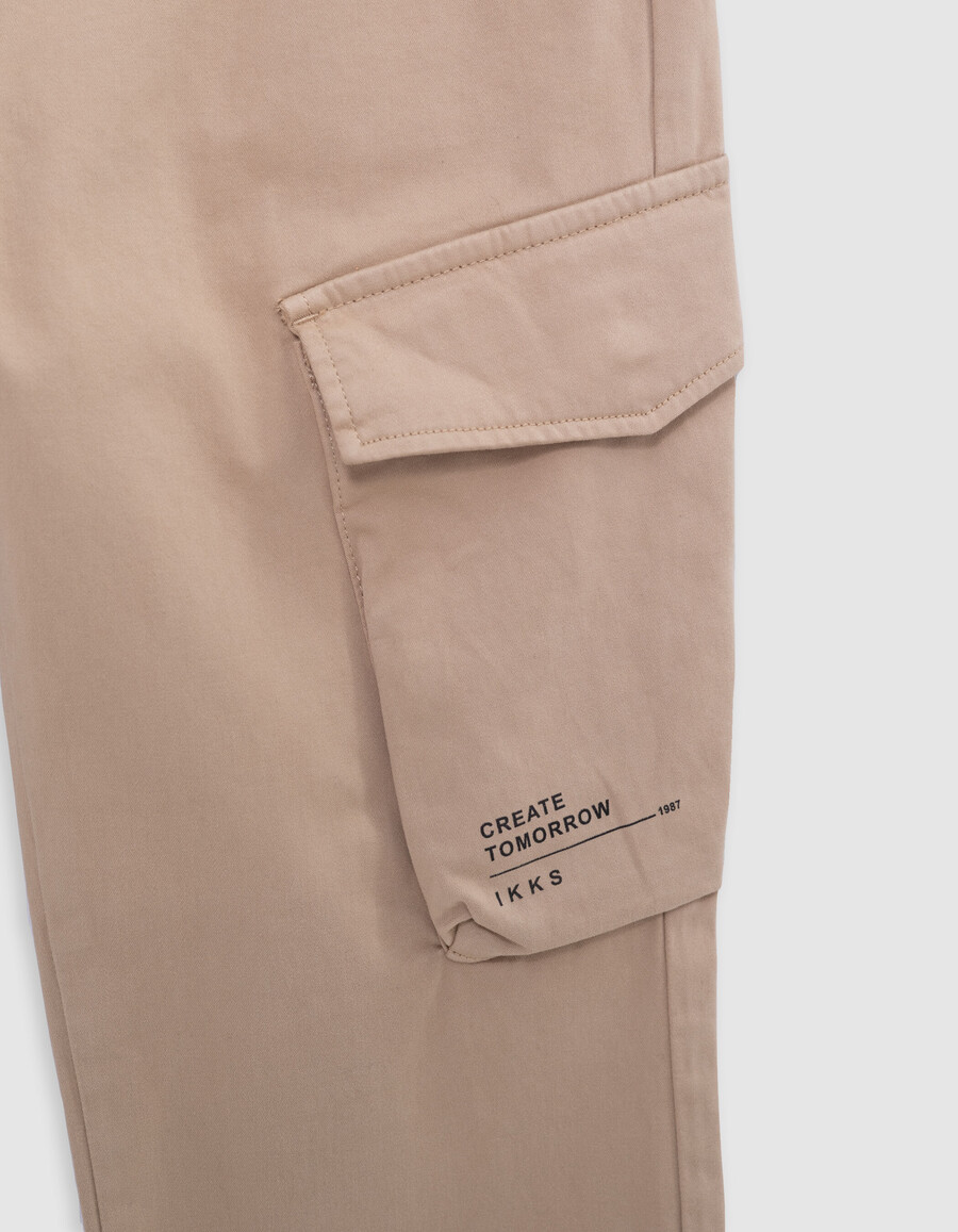 pantaloni jogger beige da bambino con elastico in vita