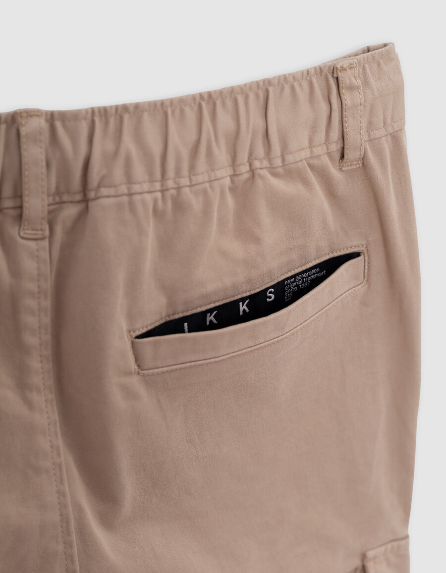 pantaloni jogger beige da bambino con elastico in vita