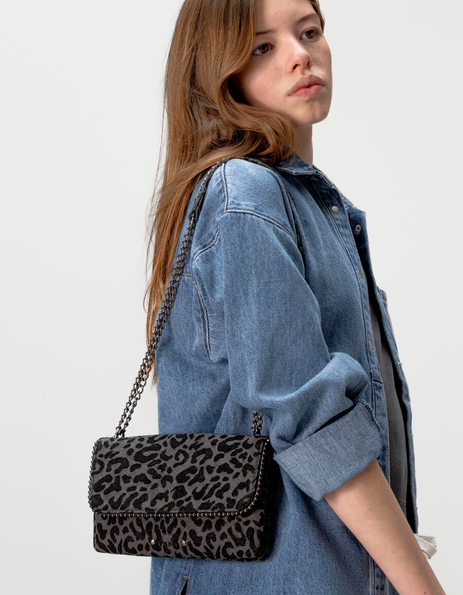 borsa nera da bambina con stampa leopardata e bordo in microperline