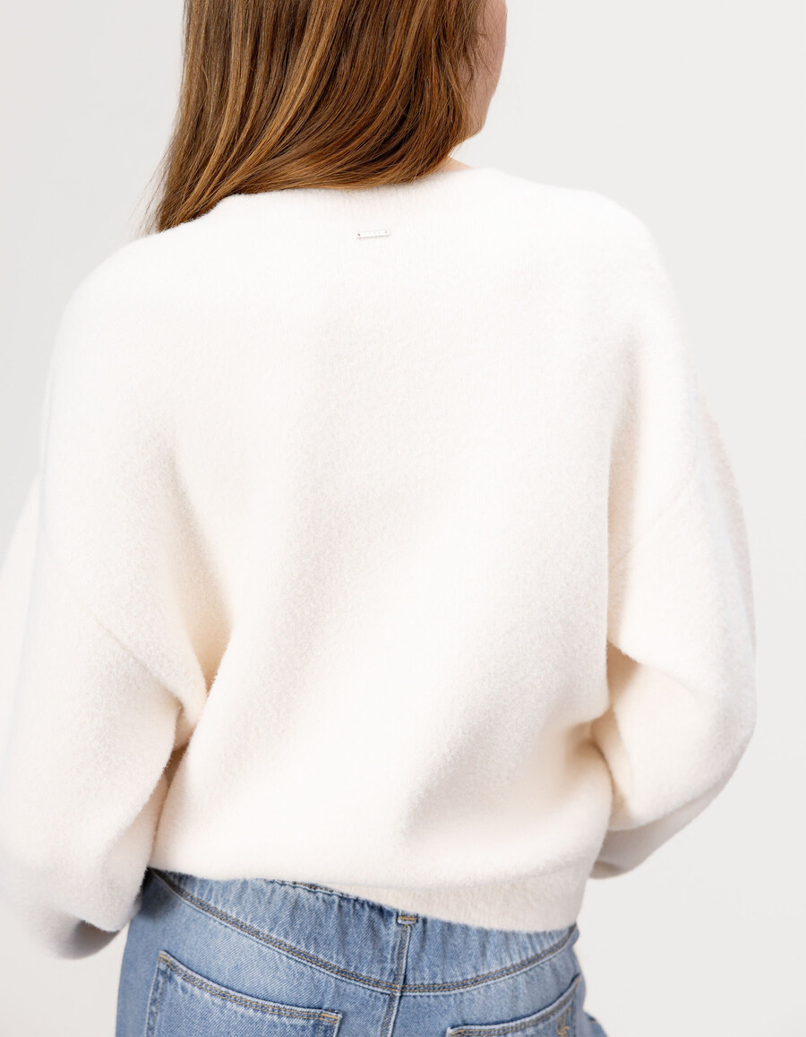 cardigan beige con bottoni in morbida maglia per bambine
