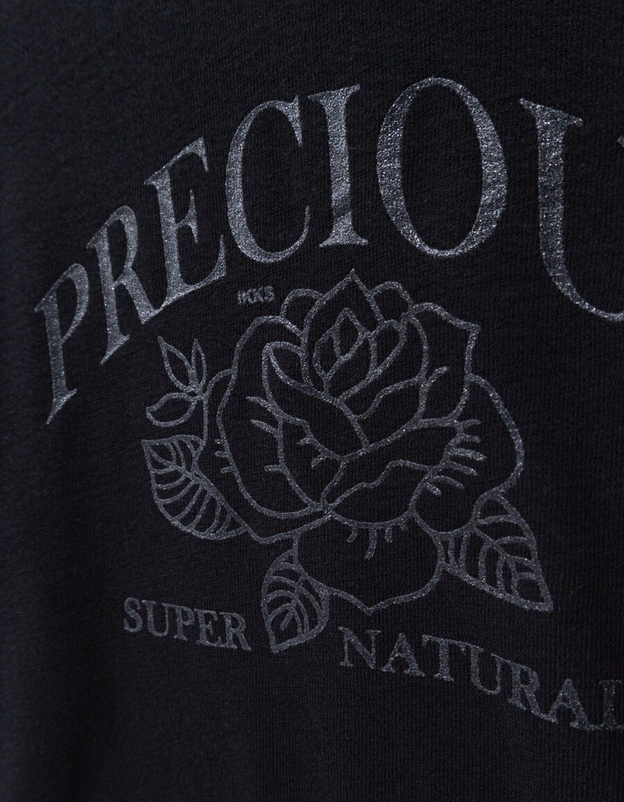 maglietta nera a maniche lunghe per bambine con slogan e rose