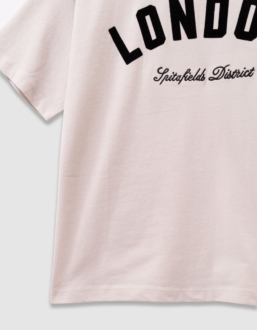 t-shirt beige in cotone biologico per bambina slogan neri