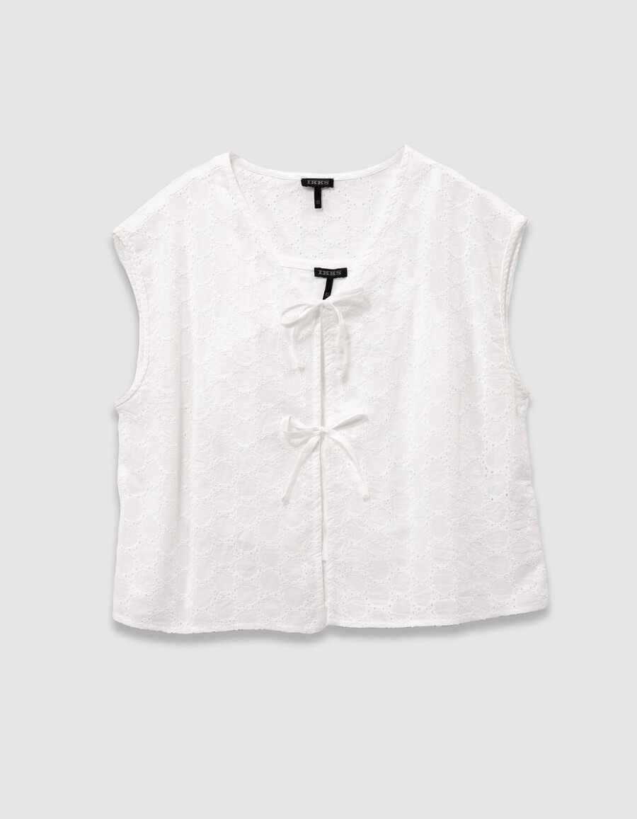 camicia bianca senza maniche in pizzo da annodare sul davanti per bambine