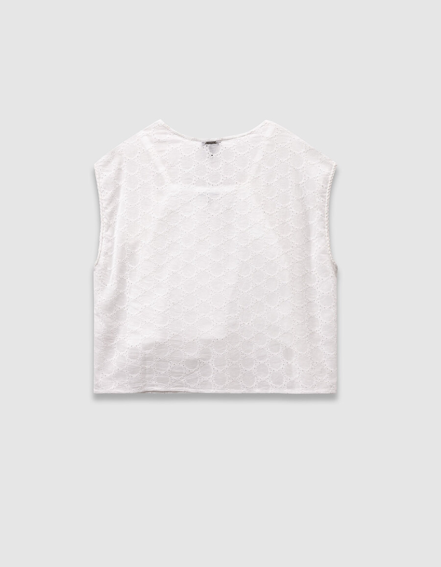 camicia bianca senza maniche in pizzo da annodare sul davanti per bambine