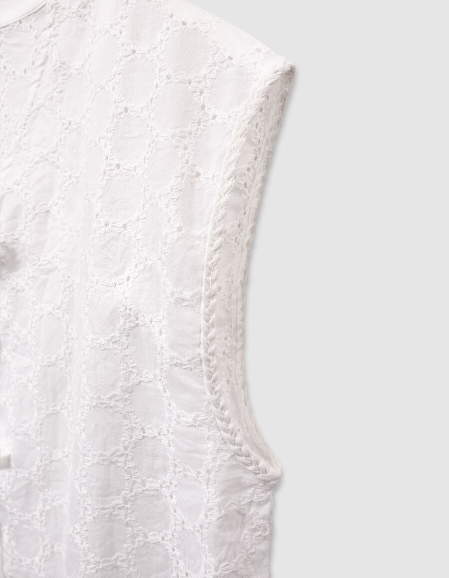 camicia bianca senza maniche in pizzo da annodare sul davanti per bambine