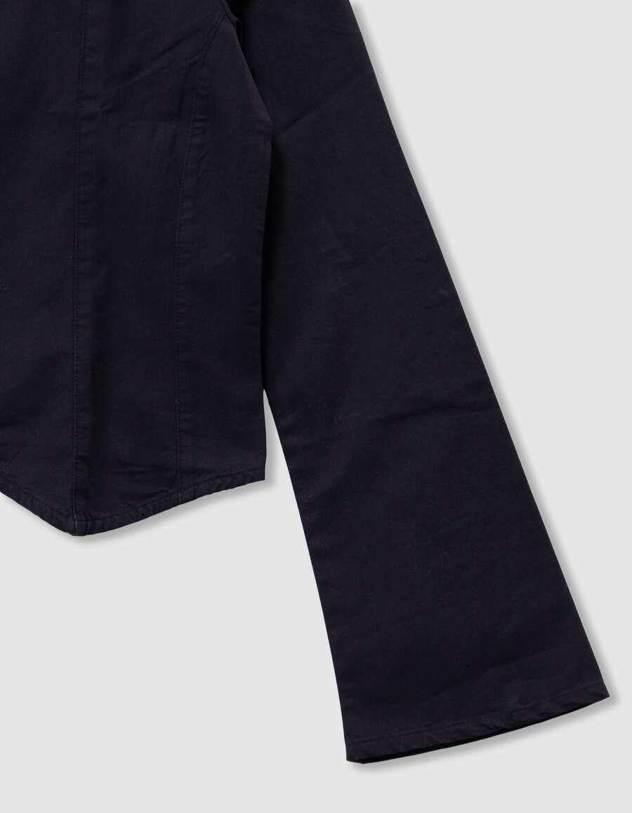 camicia nera trompe-loeil bianca sul davanti per bambine