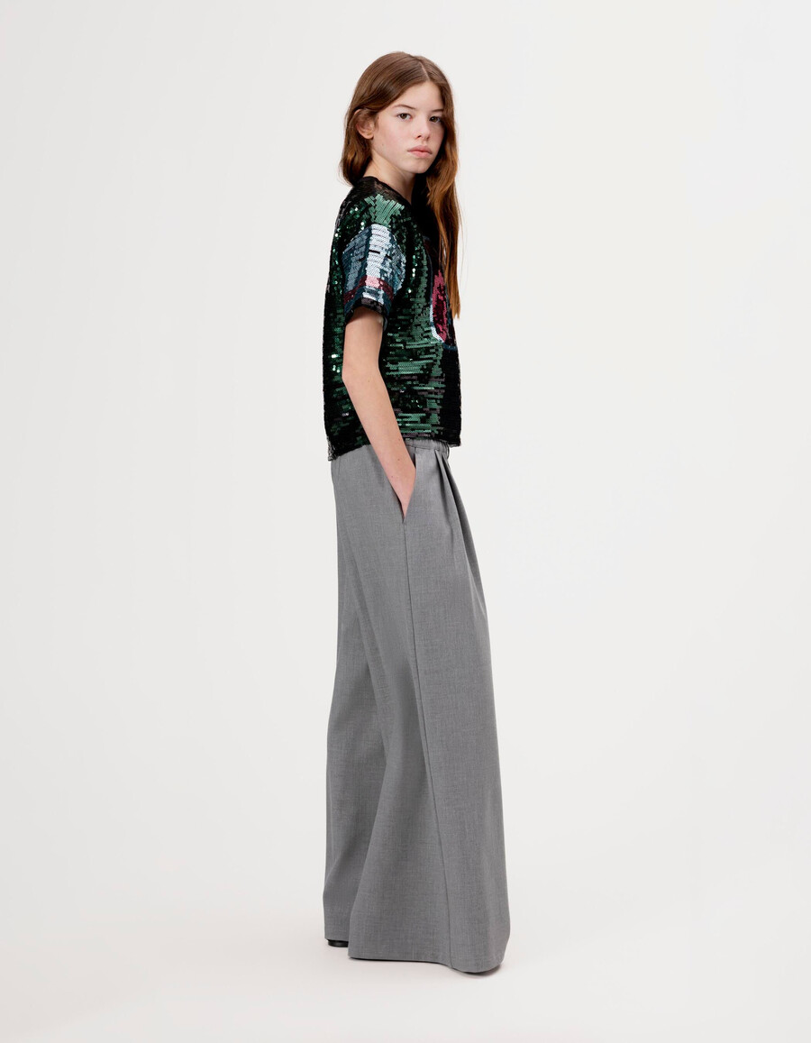 pantaloni larghi grigi da bambina con pieghe piatte