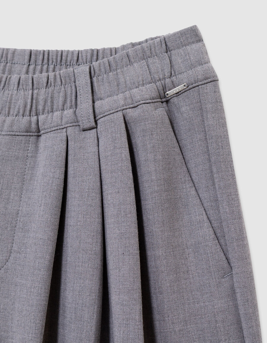 pantaloni larghi grigi da bambina con pieghe piatte