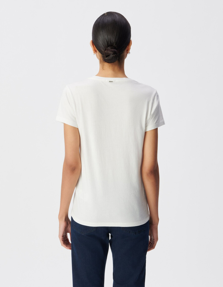 maglietta bianca con scollo a v in cotone biologico con teschio visivo da donna