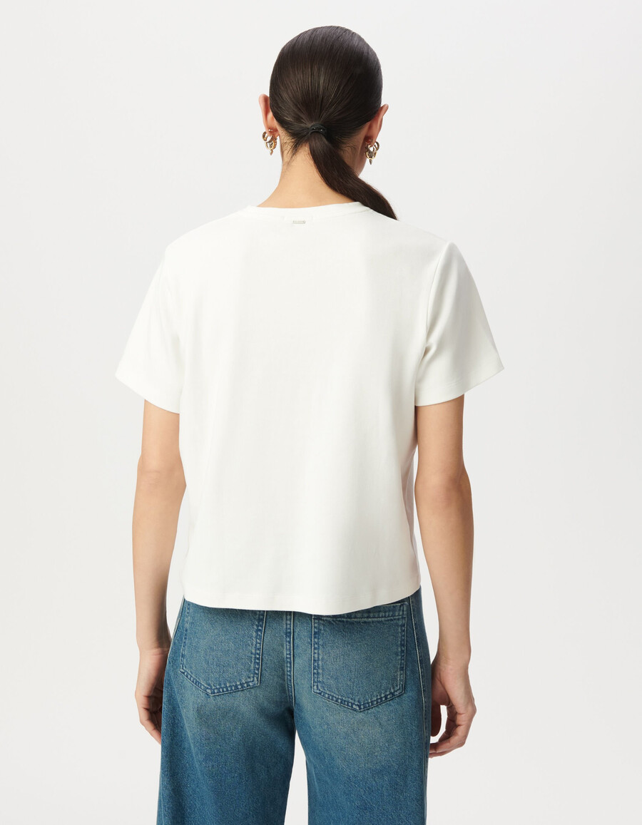 t-shirt girocollo da donna color bianco sporco con slogan glitterato