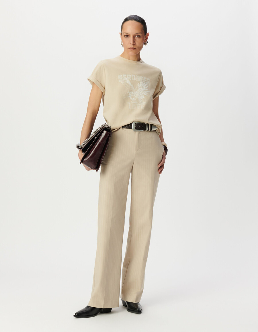 maglietta girocollo da donna in cotone biologico beige con immagine di aquila