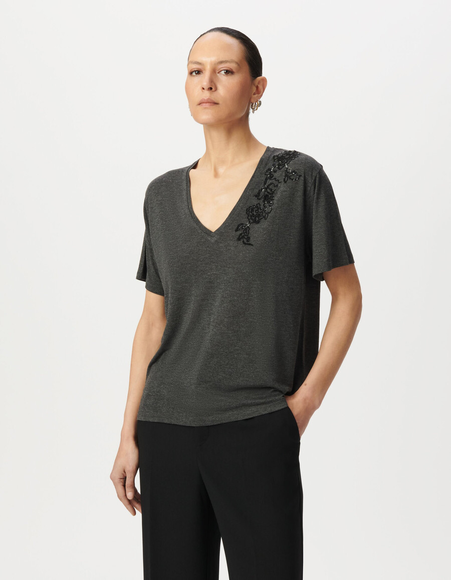t-shirt grigia da donna con fiori ricamati con paillettes