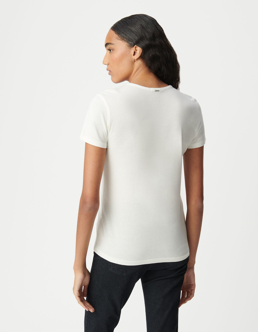 maglietta bianca a maniche corte con scollo a v da donna