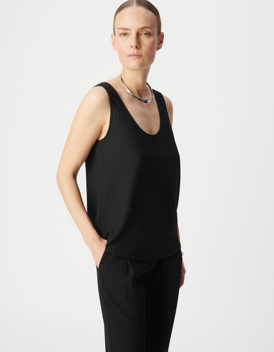 canotta nera reversibile da donna con borchie