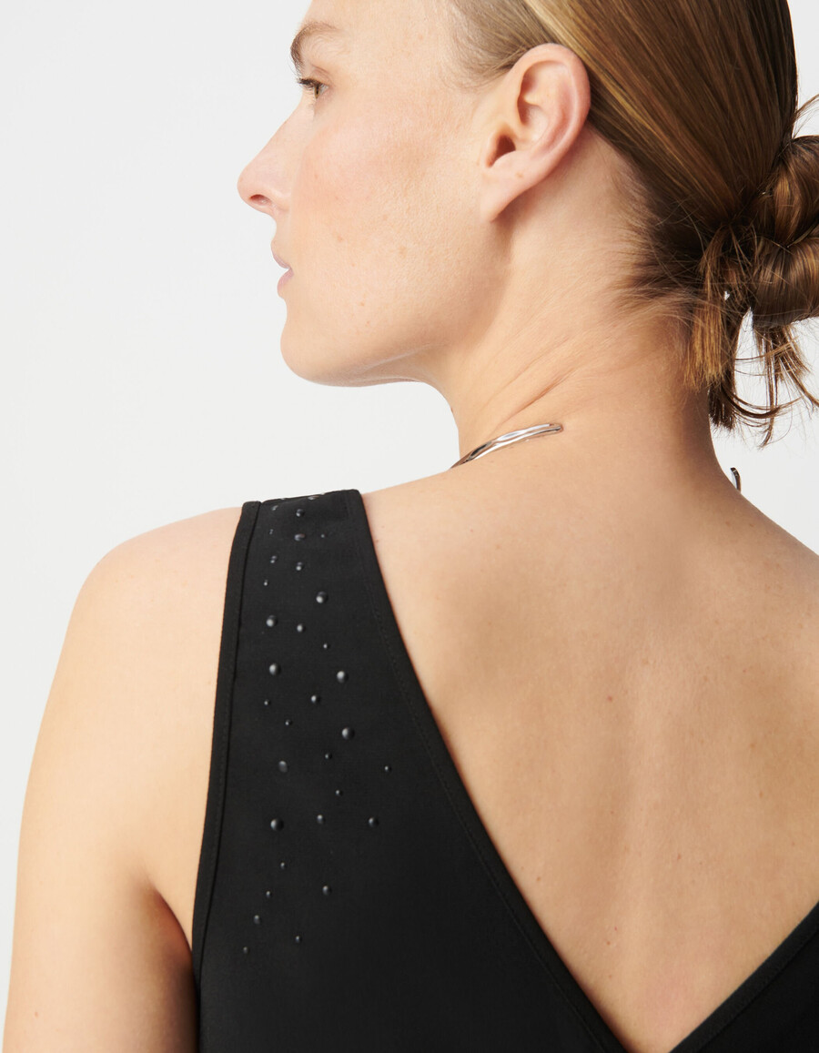 canotta nera reversibile da donna con borchie