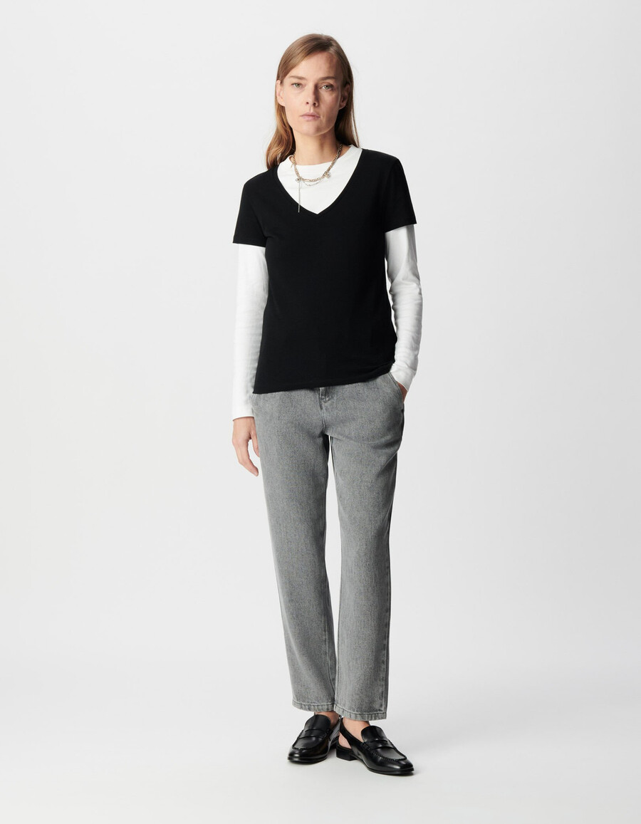 maglietta da donna nera con scollo a v e ricamo a zig zag sul retro