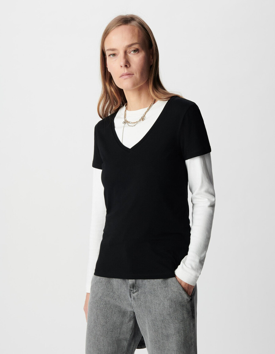 maglietta da donna nera con scollo a v e ricamo a zig zag sul retro