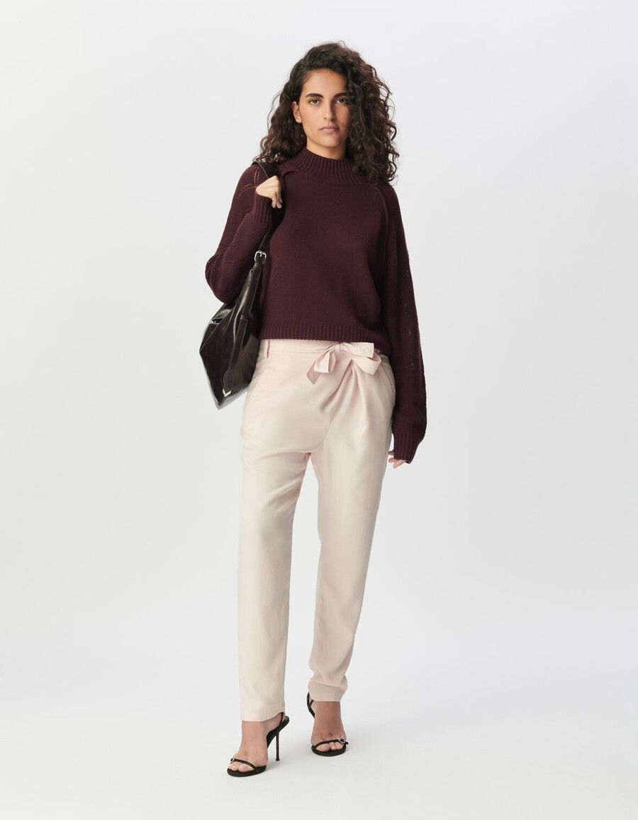 pantaloni da abito rosa asimmetrici da donna