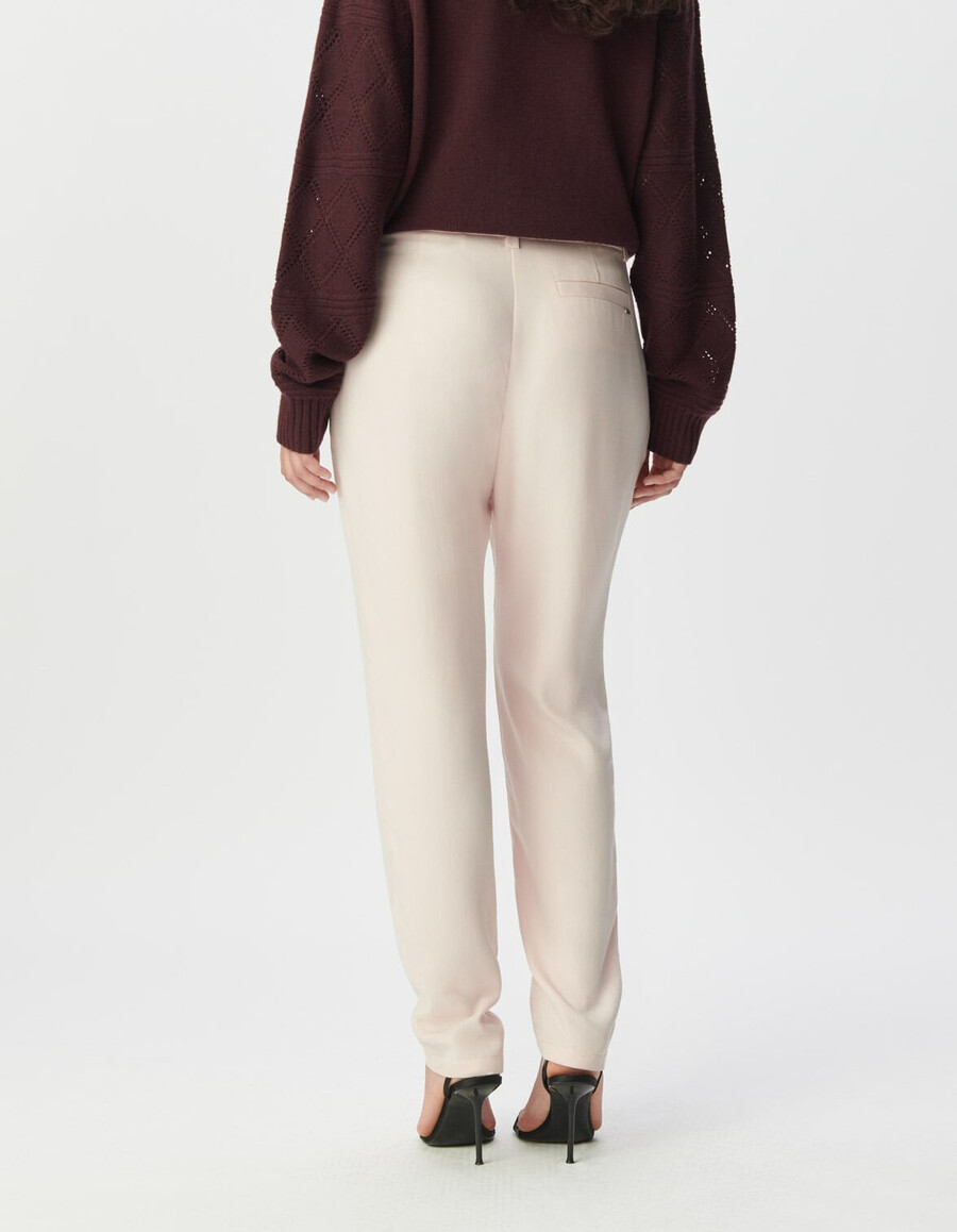 pantaloni da abito rosa asimmetrici da donna