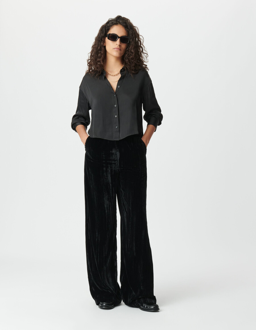 pantaloni a gamba larga in velluto nero stropicciato da donna