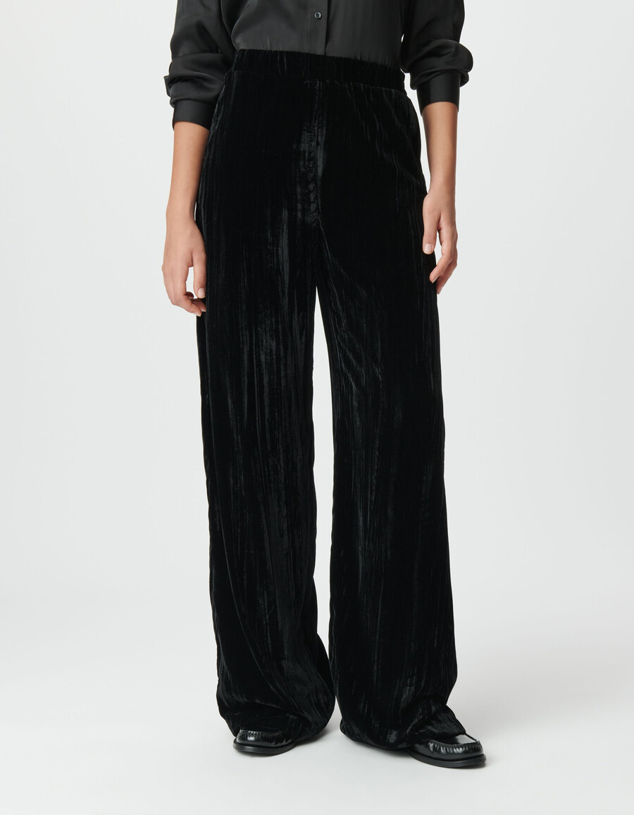 pantaloni a gamba larga in velluto nero stropicciato da donna