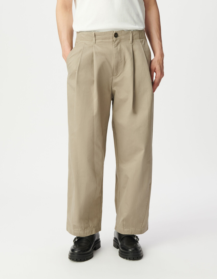 pantaloni beige larghi per uomo