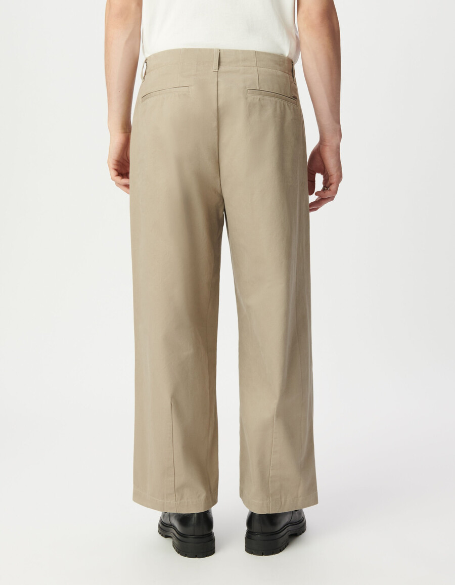 pantaloni beige larghi per uomo